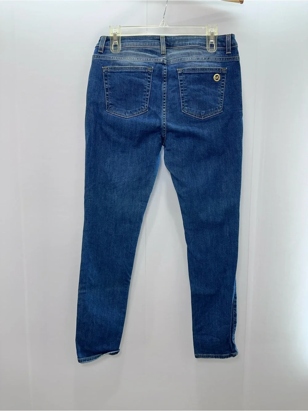 Michael Kors Women's Dark Blue Skinny Jeans with Subtle Distressing